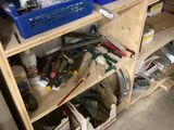 a shelf that has many different tools on it