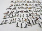 a lot of figurines that are on a table