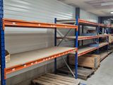 many shelves in the warehouse with boxes on them