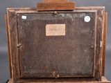 a picture of an old wooden box with a label on it