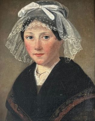 portrait of a young woman in a black dress with a white veil