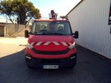 a red van parked in front of a white building