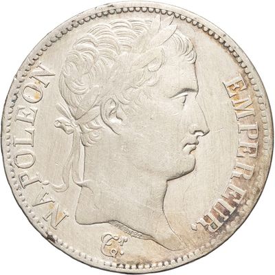 a close up of a coin with a woman ' s face on it