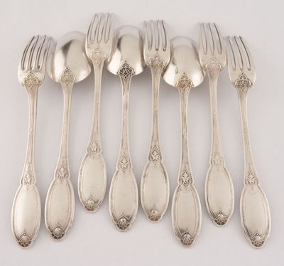 six forks and six spoons arranged in a row