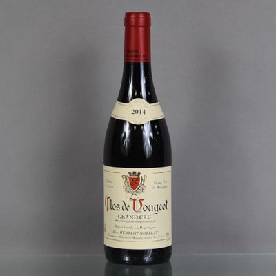 a bottle of wine that is sitting on a table