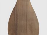the wooden paddle is made of wood and has a metal handle