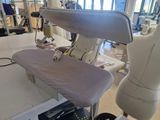 a sewing machine sitting on a table in a room