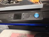 a printer that is sitting on top of a desk