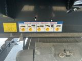 une pancarte à l'arrière d'un camion sur laquelle on peut lire « Ne pas s'arrêter »