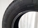a close up of a tire tire on a white surface