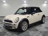 une image d'une Mini Cooper blanche, Cooper, Cooper, Cooper, Cooper, Cooper, Cooper, Cooper, Cooper, Cooper, Cooper, Cooper, Cooper, Cooper, Cooper, Cooper