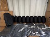 many bags of luggage in the back of a moving truck