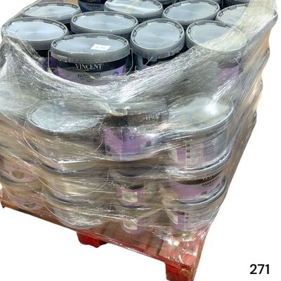 many cans of paint wrapped in plastic on a pallet