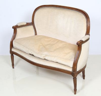 an image of a couch that is sitting on a white floor