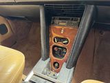a car dashboard with a radio and other electronics in it