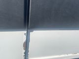 an image of a white door with a black handle