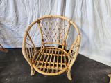 a wicker chair that is sitting on the floor