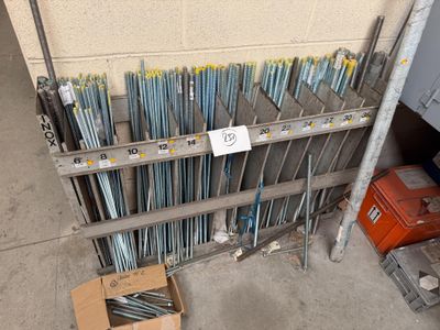a lot of steel rods and screws in a warehouse
