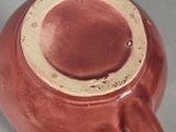 a close up of a coffee cup on a table