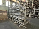 a large room with a lot of steel pipes