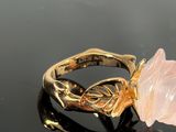 gold plated ring with a pink flower and leaf motif