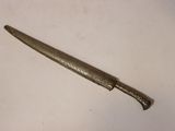 a small knife that is laying on a table
