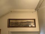 un tableau accroché au mur au-dessus d'une porte
