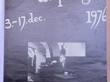 posters on the wall of a building in a foreign language