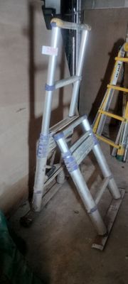 a ladder leaning against a wall in a room