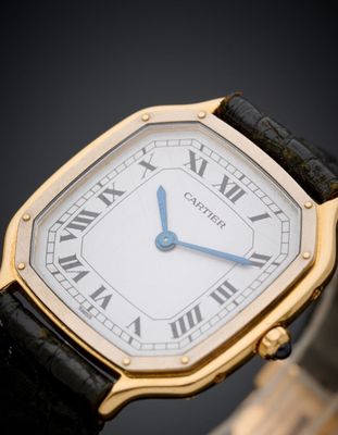 an image of a close up of a wrist watch with roman numerals