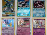 beaucoup de cartes pokemon sur la table