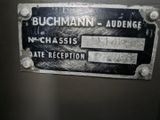 a close up of a metal sign on a refrigerator