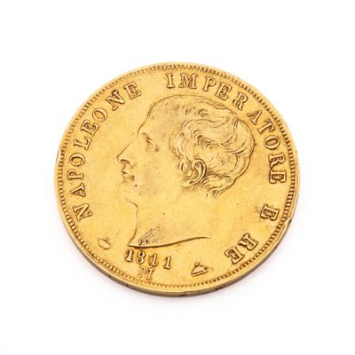 l'image d'une pièce d'or sur laquelle figure le visage d'une femme