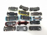 a lot of different types of miniature cars on a white surface