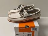 men ' s sperry boat shoes in a box on a table