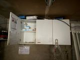 a cabinet that has a bunch of items in it