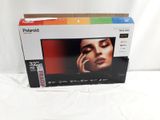 the box is open on the white surface with a woman ' s face on it