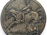 une plaque métallique sur laquelle figurent un cheval et son cavalier