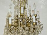 a chandelier that is hanging from the ceiling