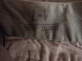 an image of a close up of a shirt with a label on it