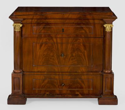 an antique chest of drawers with a wooden top and brass handles
