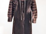 an image of a brown and black striped coat on a mannequin