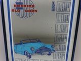 a framed picture of a blue car in a blue frame
