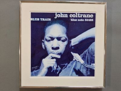 framed photograph of a portrait of a man with a cigarette in his mouth
