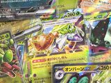 a lot of pokemon cards sitting on a table