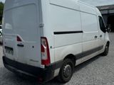 a white van that is parked in a parking lot