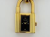 an image of a close up of a watch with a lock on it