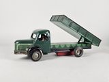a green toy truck with a dumpster on the back of it