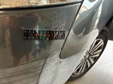 a close up of a sticker on the side of a car