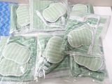 many pieces of green cloth in the package